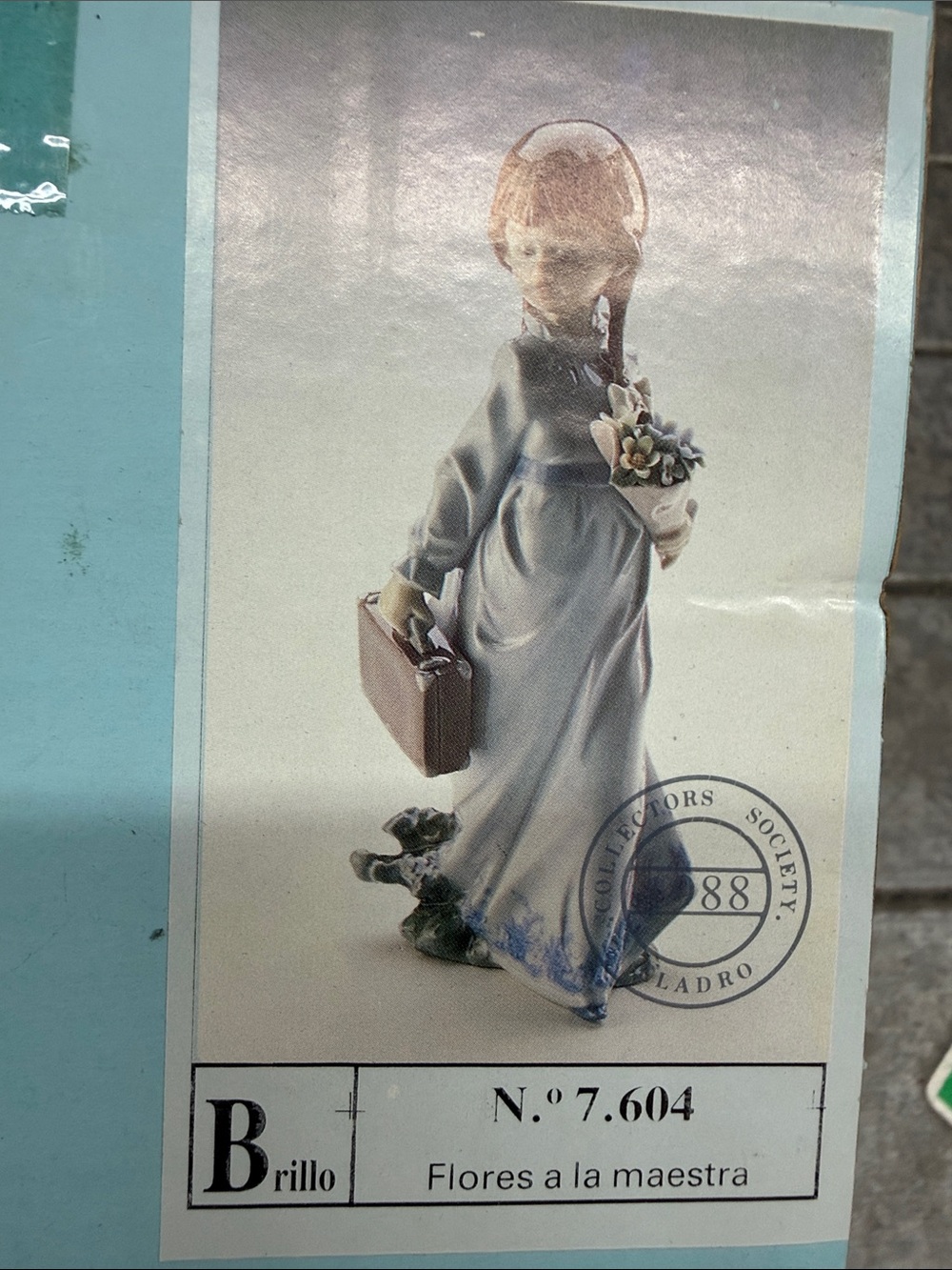 Lladro Porcelain Figurine in Light Blue and Cream with Floral Bouquet